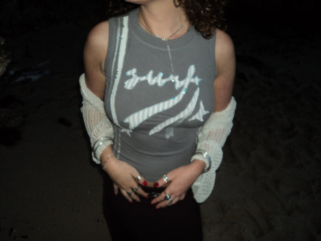 grey and turquoise shiny surf top