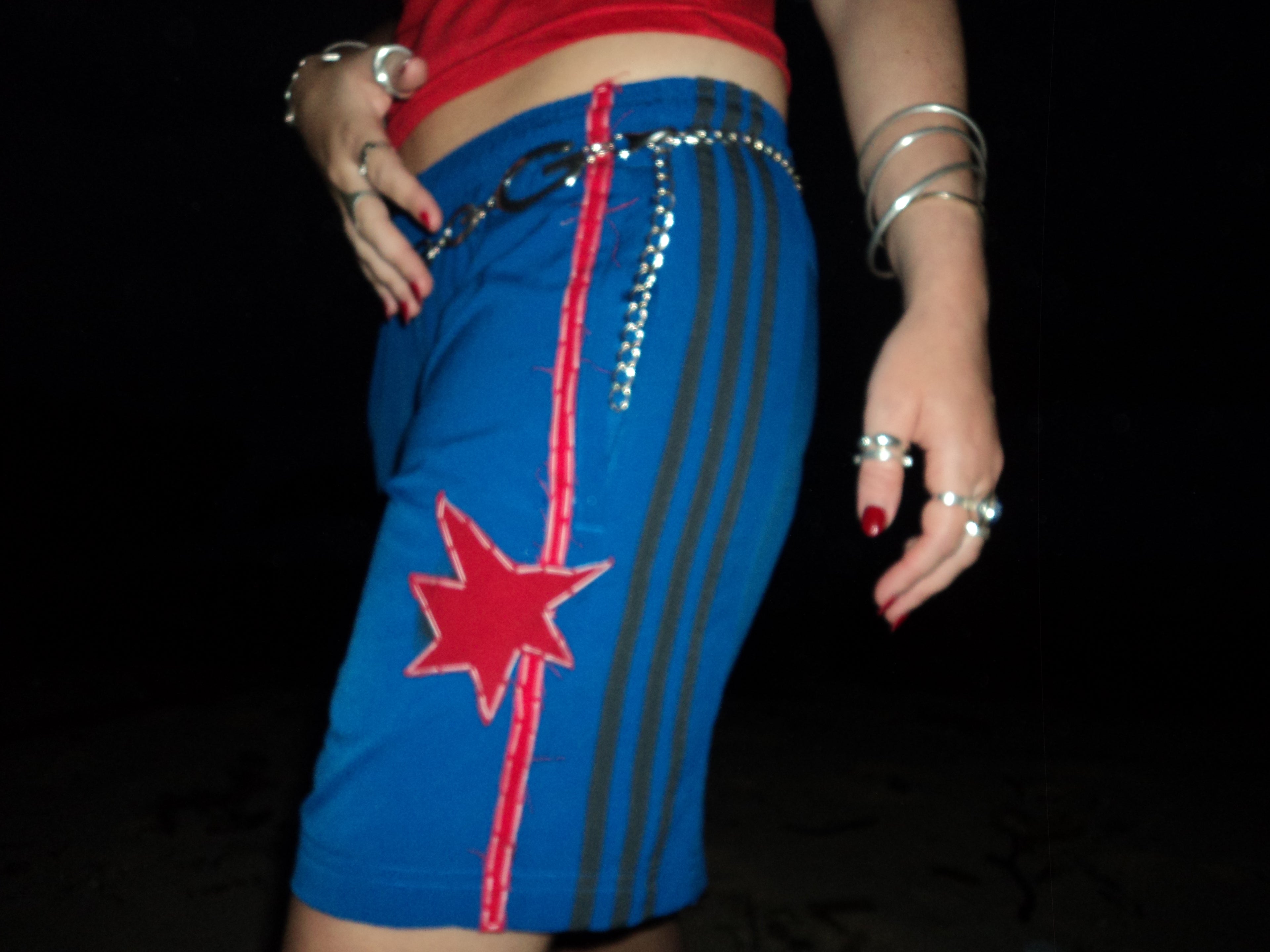 red blue Adidas pants with stars