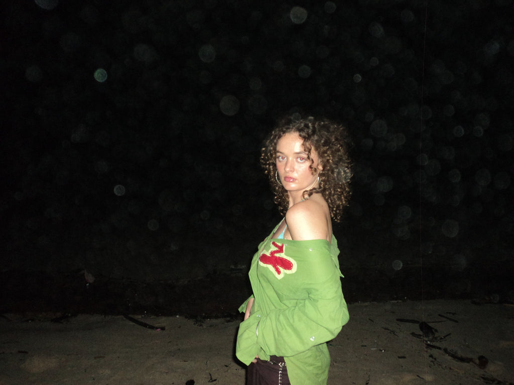 green surf print button up shirt